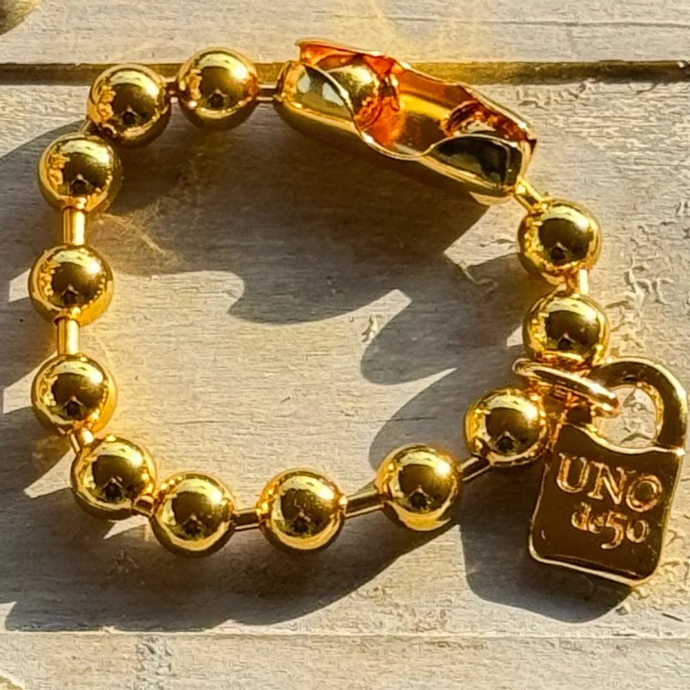 UNO de 50 elegant gold